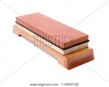 Japanese water stone on support isolated on white background.