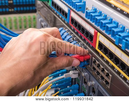 technician pluging in wires