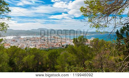 Hill side view of the city - St Antoni de Portmany, Ibiza, on a clearing day in November, kindly war