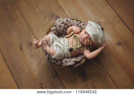 Newborn Baby Boy Wearing A Little Man Suit