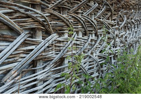 woven wood fence in the remote mountain village of Omalo in the Tusheti region of Georgia
