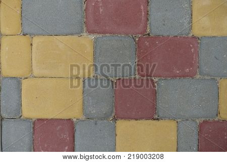Colorful rectangular concrete pavement blocks from above