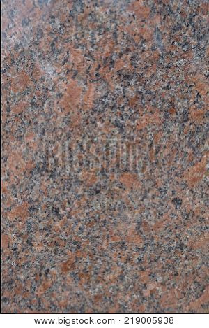 Texture of polished pink and grey granite stone