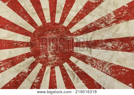 Background of old grunge vintage dirty faded shabby distressed Japan Nippon flag or historical imperial army Rising Sun flag