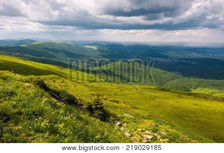 grassy slopes of Carpathians before the storm. beautiful mountainous landscape in summertime