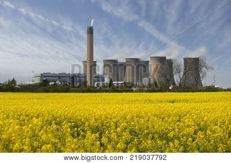 Eggborough Power Station With Field Of Rape Seed Yorkshire England