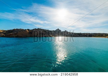 Sun shining over Spalmatore shore in Sardinia