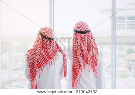 back view of couple young Arabian business man checking construction site in office building successful meeting partner teamwork community and connection concept soft focus