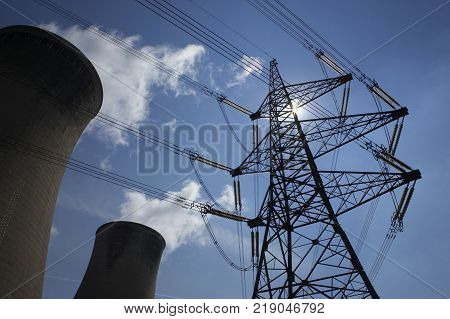 Electricity Pylon And Cooling Towers In Silhouette Eggborough Power Station Yorkshire England