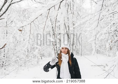 Beautiful Young Girl In A White Winter Forest