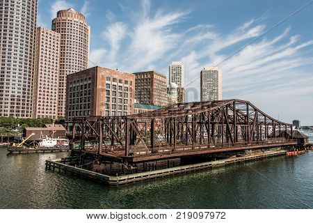 Boston massachusetts USA view on waterfront with skyscrapers and old avenue bridge