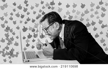 Asian Business Enthusiasts Celebrate Successful Thumbs Up.Thumbs Up Portable Computer Graphics Used In Graphic Design