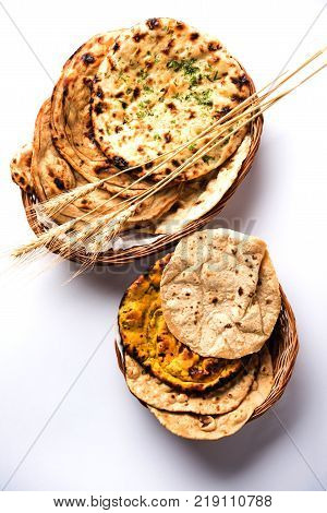 Assorted Indian Bread Basket includes chapati, tandoori roti or naan, paratha, kulcha, fulka, missi roti