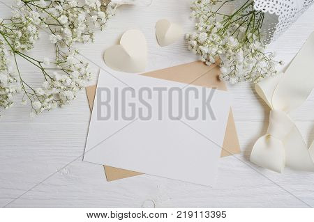 mockup Letter with a calligraphic pen greeting card for St. Valentine's Day in rustic style with place for your text, Flat lay, top view photo mock up.