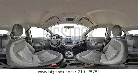 GRODNO BELARUS - OCTOBER 12 2017: Full 360 by 180 degree seamless equirectangular equidistant spherical panorama in interior of prestige modern car Ravon white background. Skybox for vr ar content