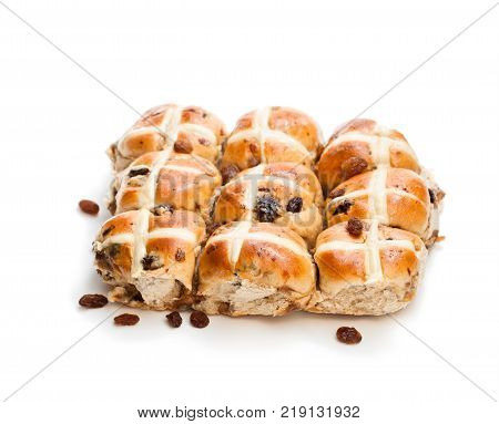 Easter cross buns and sultanas isolated on white background