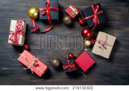 Red Christmas  Gift  Box With Red Ribbon And Fir Branches