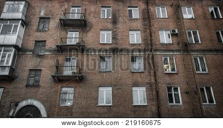 Old building fragment. Old apartment building in Ust-Kamenogorsk Kazakhstan