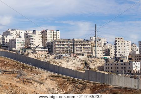 The Israeli security fence separating Israel from the West Bank of Jordan - Judea and Samaria