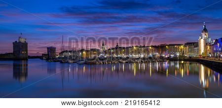 Panoramic view of Harbor by night with beautiful sunset in La Rochelle Town