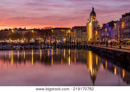 Harbor by night with beautiful sunset in La Rochelle Town
