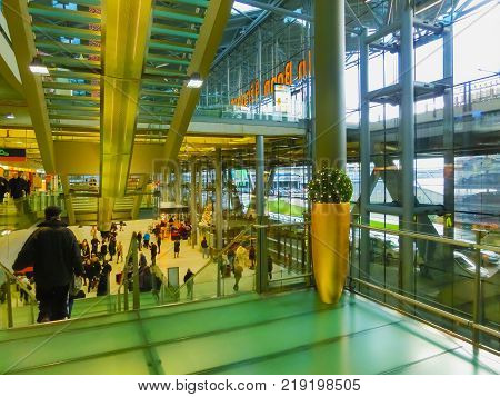 Cologne, Germany - December 12, 2017: The people going at Cologne Bonn Airport at Cologne, Germany on December 12, 2017.