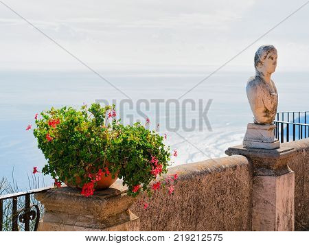 Sculpture and flowers at the terrace in Ravello village Tyrrhenian sea Amalfi coast Italy