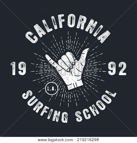 Surfing school California grunge print for apparel with shaka - vintage surf hand gesture. Typography emblem for t-shirt. Design for clothes. Vector illustration.