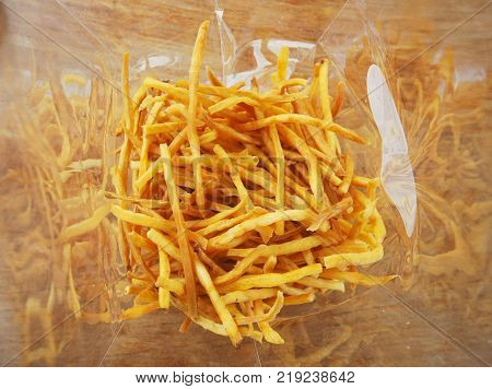 Fried sweet thai potato in transparent plastic bag