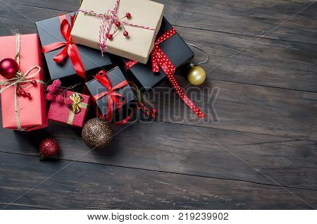 Red Christmas  Gift  Box With Red Ribbon And Fir Branches