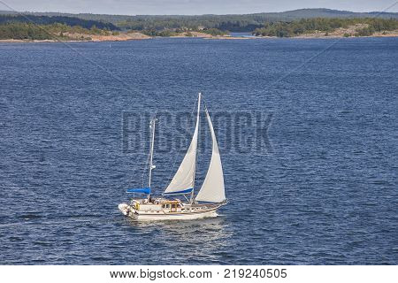 Sailing in Finland coastline. Aland archipelago. Finnish summer sport. Outdoor