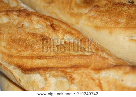 A baguette either simply baguette, so called baguette of Paris, or still French loaf, but also bread baguette is a variety of bread, recognizable in its lengthened (stretched out) shape. Even if this shape of bread is symbolic of France, the baguette is a