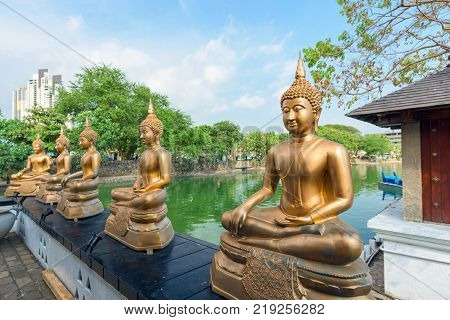 COLOMBO SRI LANKA - MARCH 24 2016: Buddha statues at Seema Malaka Temple in Colombo Sri Lanka.