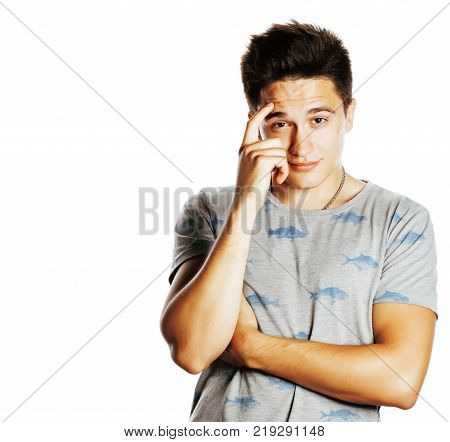 young attractive man isolated thinking emotional on white close up