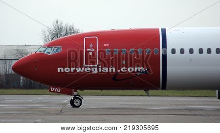 BERLIN, GERMANY - JAN 17th, 2015: Norwegian Boeing 737 airplane arriving at the gate in Berlin Schonefeld airport SXF.