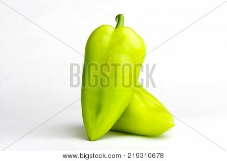 Bulgarian pepper on white background. Pepper is green.