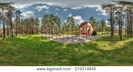 Full 360 degree seamless panorama in equirectangular spherical projection near vacation home in forest