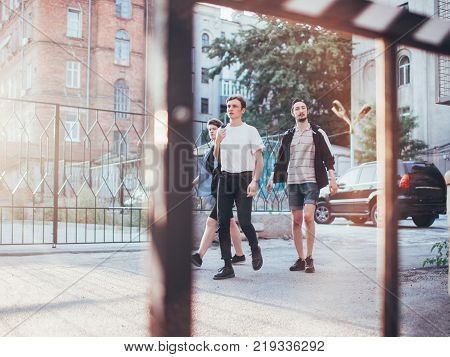 bffs have a good time together walking in the city. young teenagers leisure concept