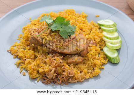 Chicken Biryani with rice and sauce. halal food (Khao Mok Gai)