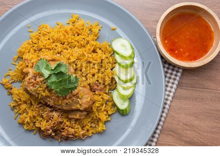 Chicken Biryani with rice and sauce. halal food (Khao Mok Gai)