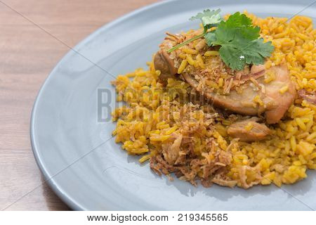 Chicken Biryani with rice and sauce. halal food (Khao Mok Gai)