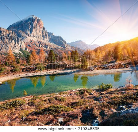 Splendid view of Limides Lake and Lagazuoi mountain. Colorful autumn morning in Dolomite Alps Falzarego pass Cortina d'Ampezzo lacattion Italy Europe. Artistic style post processed photo.
