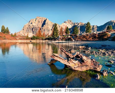 Splendid view of Limides Lake and Lagazuoi mountain. Colorful autumn morning in Dolomite Alps Falzarego pass Cortina d'Ampezzo lacattion Italy Europe. Artistic style post processed photo.