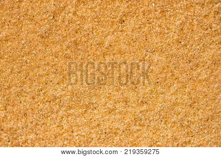 Background. Sand close up with large grains of sand