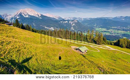 View from cableway cabine above the Konigsee lake on Schneibstein mountain ridge. Colorful summer morning on a border of Germany and Austrian Alps. Berchtesgaden location Bavaria Germany Europe.