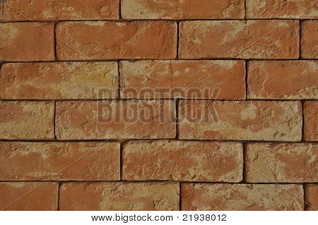 Muro di mattoni rossi