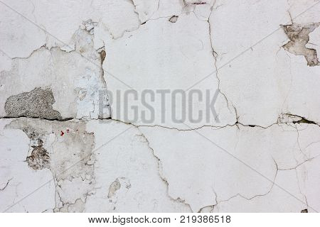 Old weathered concrete wall texture with number of scratches
