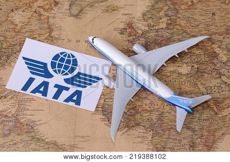 SARANSK, RUSSIA - NOVEMBER 05, 2017: International Air Transport Association logo with model of airplane on world map.