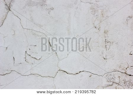 Old weathered concrete wall texture with number of scratches