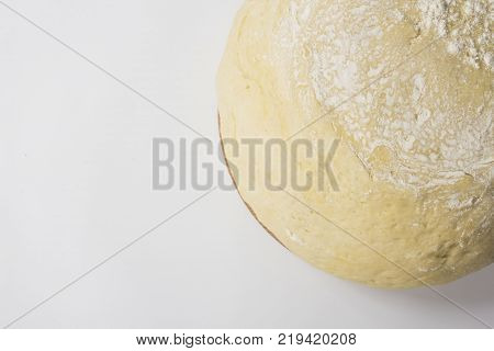 dough with close-up. man is preparing bread dough